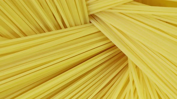 Raw Rye Spaghetti Texture Background. Close Up . Italian Spaghetti Raw Food Background Texture.