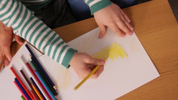 Mother and Son with Pencils Drawing at Home