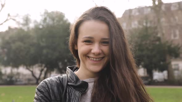 Girl portrait at park, slow motion