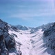 Flying in the gorge between high snow peaks - VideoHive Item for Sale