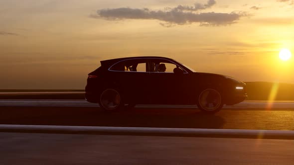 Black Sport SUV and Sunset Landscape