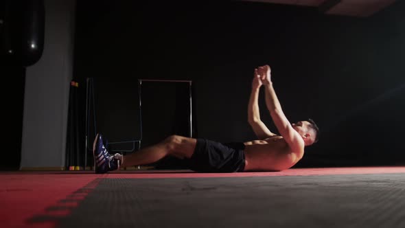 Box Training  Fit Shirtless Man Pumping His Abs