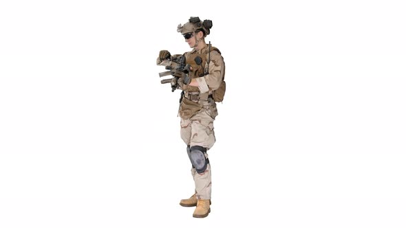 Soldier in Camouflage Gear Checking His Uniform on White Background