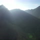 Aerial landscape view of the sun is shining through the greenery rainforest mountains by drone - VideoHive Item for Sale