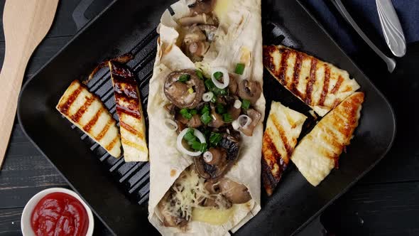 Assortment of Street Food on a Dark Wood Table