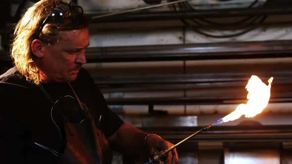 Welder burning welding torch