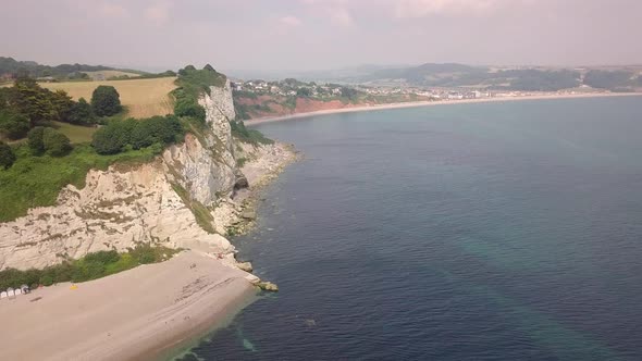 An aerial view of the beautiful white cliffs of Beer in Devon, UK.