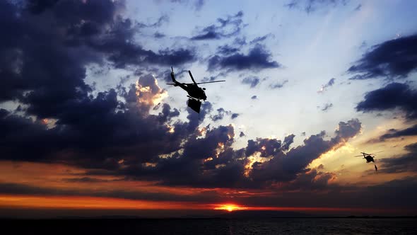 Helicopter Is Passing On Cloudy Sunset Sky 1