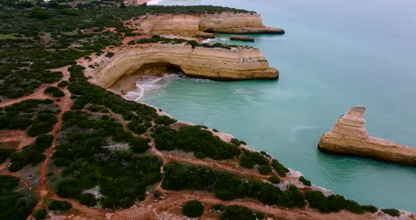 Aerial footage from the Algarve coast's aqua colored water