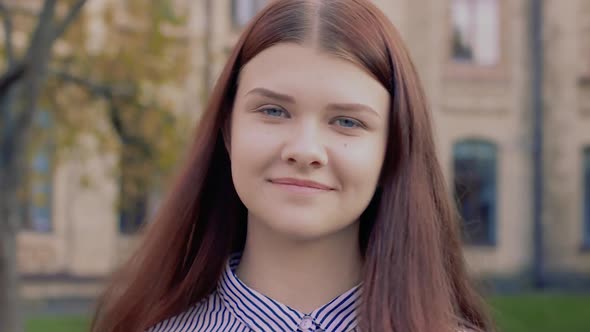 Emotional Video-portrait Nodding Approvingly Beautiful Young Girl