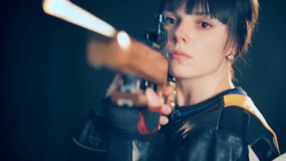 Woman Training Sport Shooting with Air Rifle Gun