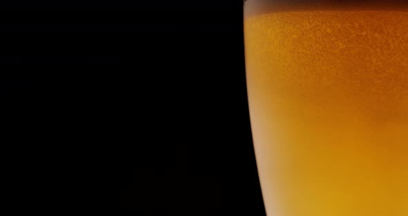 Beer in a Glass on a Dark Background. Alcohol