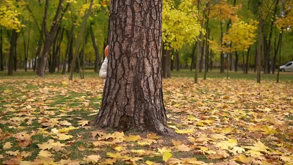 Two Happy Funny Children Kids Boy Girl Walking in Park Forest Enjoying Autumn Fall Nature Weather