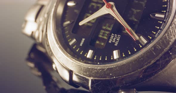 Macro footage of a hand watch with the seconds hand ticking