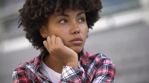 Melancholic African American Woman Thinking About Life