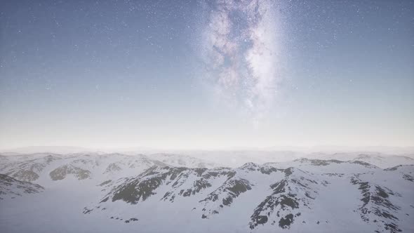 Milky Way Above Snow Covered Terrain alt