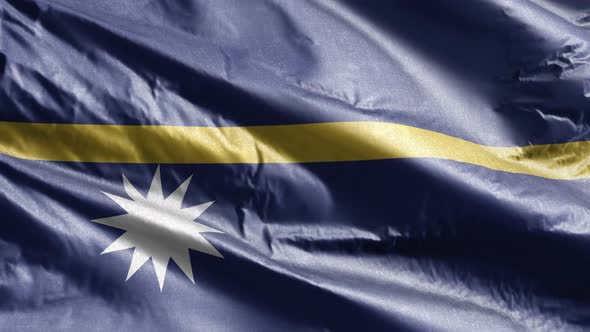 Nauru textile flag waving on the wind. Slow motion. 20 seconds loop. 