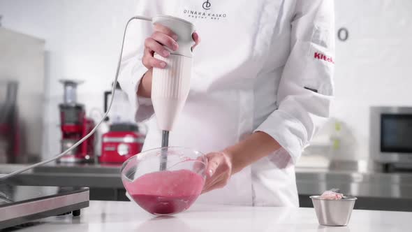 Pastry Chef Whips Mousse for a Signature Cake