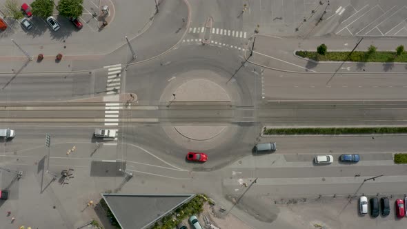 Top down static aerial view above round-about intersection in Helsinki, Finland.