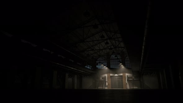 Lights gradually turning on in the large loft hall or warehouse at night.