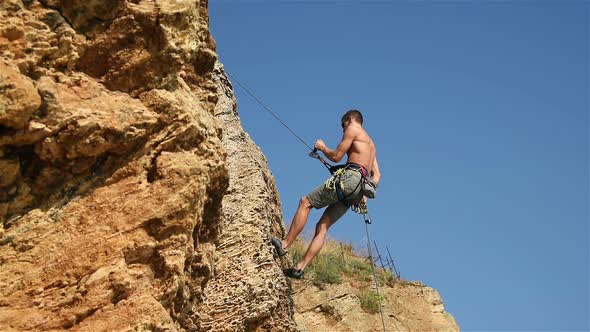 Climber Doing Down