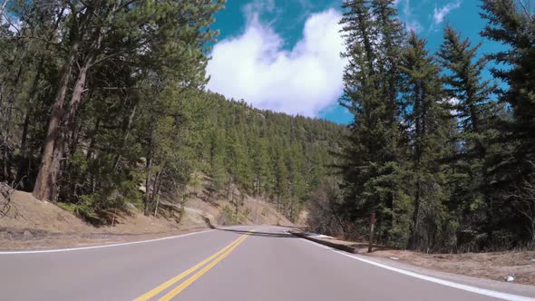 POV point of view - Driving to top of Pikes Peak in early Spring.