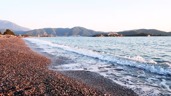 view from Fethiye Calis Beach with small waves and amazing landscape