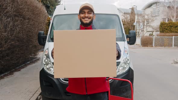 Young Indian Man Delivering Parcel