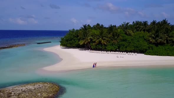 Drone aerial nature of resort beach break by blue ocean with sand background