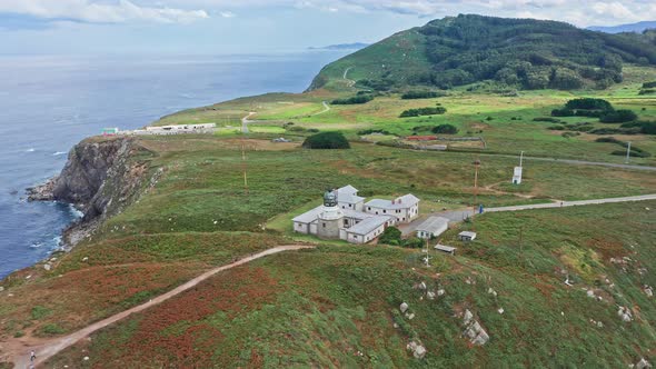 Estaca de Bares Lighthouse on top of coastal cliff. A Coruña, Galicia, Spain