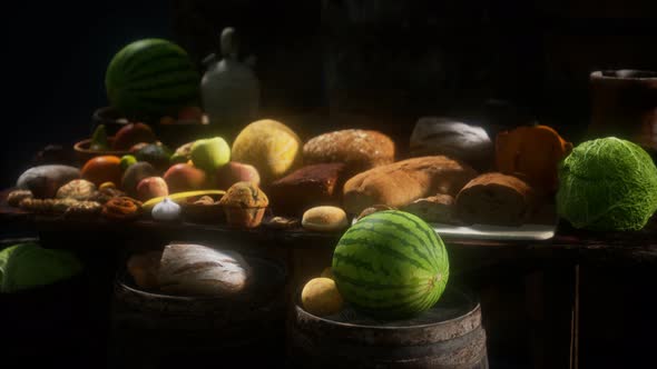 Food Table with Wine Barrels and Some Fruits, Vegetables and Bread