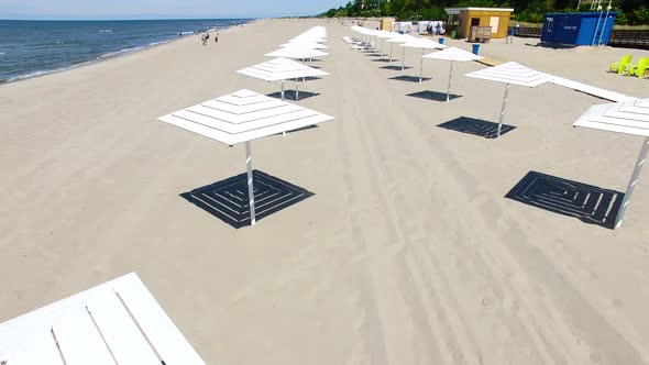 Aerial view of the beach umbrellas in summer