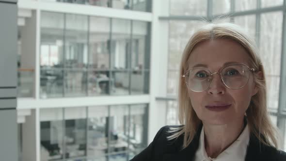 Close-Up Portrait of Blonde Businesswoman