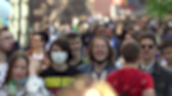 Silhouettes of People Walking in a Crowd Slow Motion