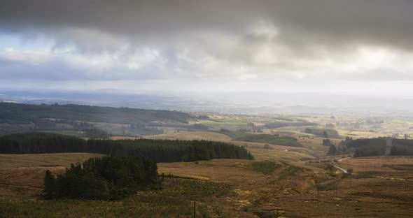 Time lapse of a remote rural landscape during dramatic rain shower weather in Ireland.