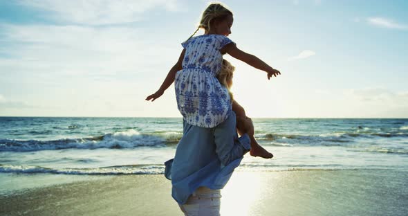 Mother and Daughter at the Beach alt