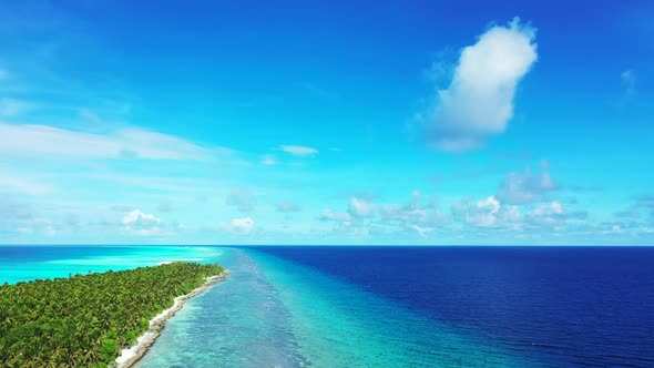 Aerial top view tourism of luxury seashore beach holiday by blue green sea and white sandy backgroun