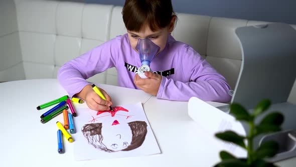 Little Girl Makes Inhalation with Medical Nebulizer While Sitting at Table and Draw with Markers