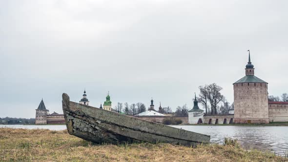 Old boat in front of the walls of the Kirillo-Belozersky Monastery. Russia