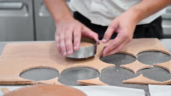 Pastry Chef Cutting Sponge Cake Layers with Round Shape Mold