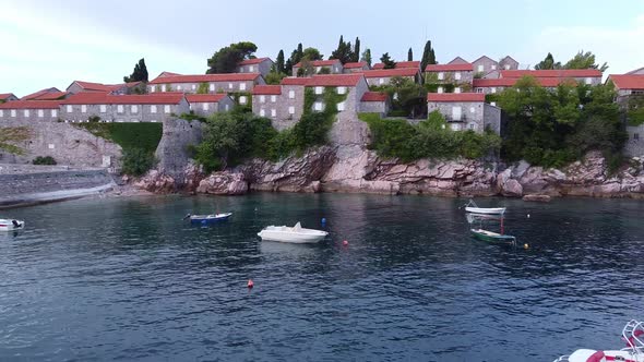 Drone View of Red Roof Houses on Rocky Island