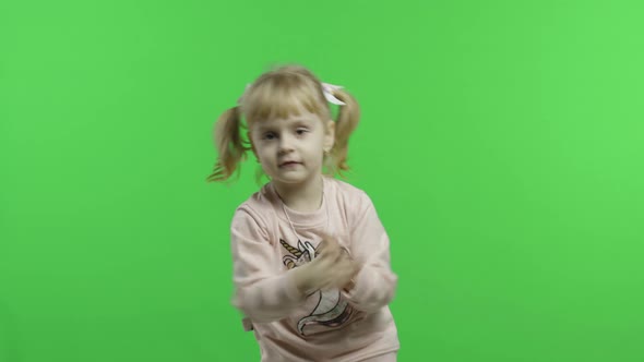 Girl in Unicorn Sweatshirt Dancing