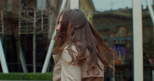 Cute Woman Walking on the Street Look at Camera Spinning Happy Smile Beautiful Portrait.