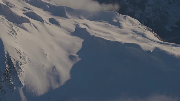 Aerial Panoramic View of Canadian Mountain Covered in Snow