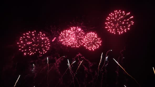 Spectacular Fireworks Display with Confetti on Night Sky