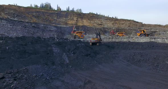 Excavators Dig Coal