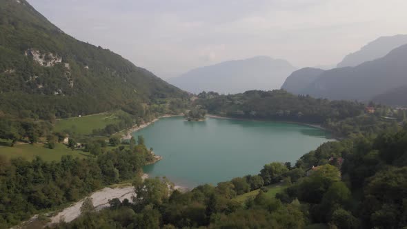 Aerial view in 4k of Tenno Lake, Trentino, Italy.