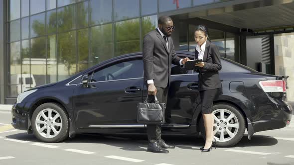 Female Lawyer Clarifying Information With Her Client in Informal Atmosphere