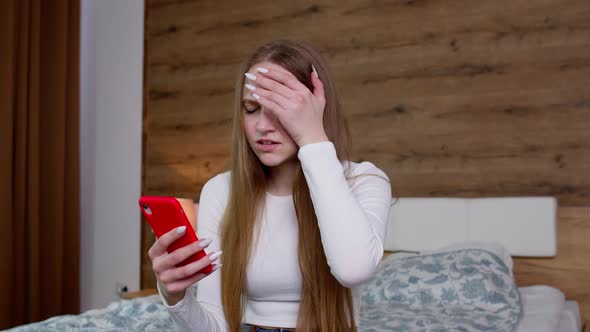 Sad Upset Dissatisfied Irritated Girl Reading Bad News on Mobile Phone Unhappy After Shopping