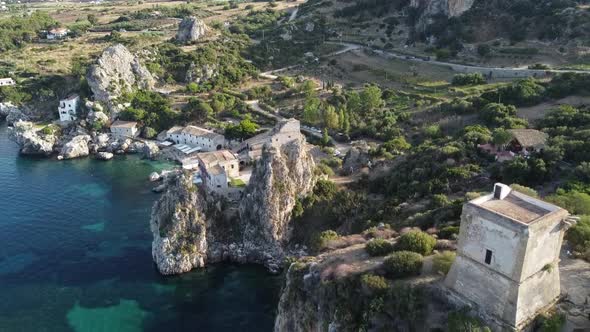 Torre Bennistra And Faraglioni Stacks Near The Tonnara di Scopello Museum In Scopello, Province Of T